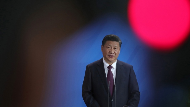 Xi Jinping, China's President, speaks during a news conference with Germany's Chancellor Angela Merkel (not pictured) at the Chancellery in Berlin, Germany, on Wednesday, July 5, 2017.