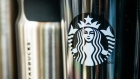 A logo sits on branded beverage containers inside a Starbucks Corp. cafe in the Sandton area of Johannesburg, South Africa, on Monday, Jan. 14, 2019. While South Africa's economy emerged from a recession in the third quarter, growth remains sluggish, hampered by subdued business confidence, higher taxes imposed by the government in February and a tight monetary-policy stance. 