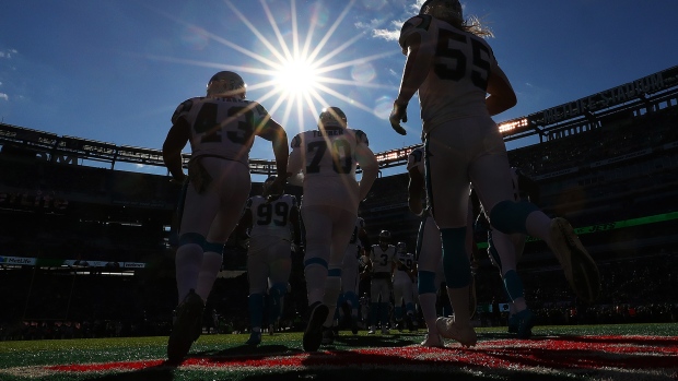 The Carolina Panthers enter the field against the New York Jets prior to their game at MetLife Stadium on November 26, 2017 in East Rutherford, New Jersey. 