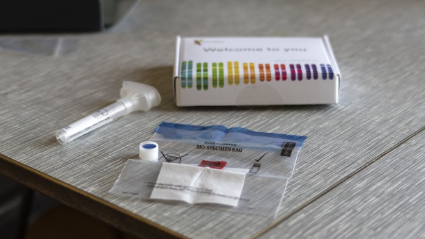 A 23andMe Inc. DNA genetic testing kit is arranged for a photograph in Oakland, California, U.S.