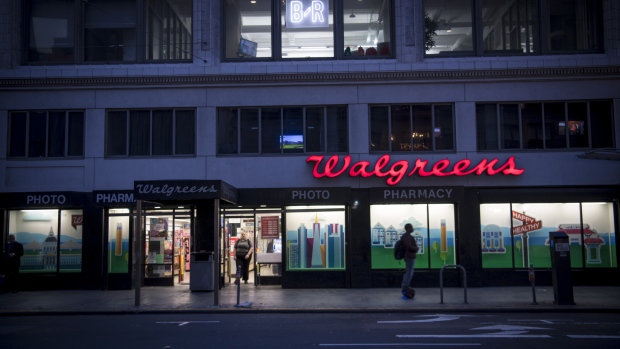 Illuminated signage is displayed outside a Walgreens Boots Alliance Inc. store in San Francisco, California, U.S., on Thursday, Dec. 28, 2017. Walgreens Boots Alliance Inc. is scheduled to release earnings figures on January 4. 