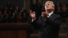 U.S. President Donald Trump applauds while delivering a State of the Union address to a joint session of Congress at the U.S. Capitol in Washington, D.C., U.S., on Tuesday, Jan. 30, 2018. Trump sought to connect his presidency to the nation's prosperity in his first State of the Union address, arguing that the U.S. has arrived at a "new American moment" of wealth and opportunity. Photographer: Win McNamee/Pool via Bloomberg