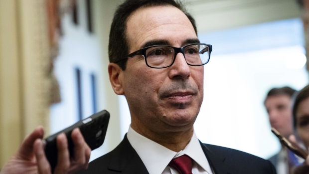 Steven Mnuchin, U.S. Treasury secretary, speaks to members of the media after meeting with Senate Republicans on Capitol Hill in Washington, D.C., U.S. on Tuesday, Jan. 15, 2019. Mnuchin defended his decision to relax sanctions on three Russian companies linked to oligarch Oleg Deripaska and said he doesn't have any immediate plans to agree to an extension for Congress to act. 