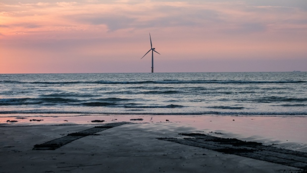 An offshore wind turbine, operated by Swancor Holding Co., stands in the Taiwan Strait off the coast of Miaoli County, Taiwan, on Thursday, July 26, 2018. Since a disastrous 2011 reactor meltdown in Japan, more than 1,400 miles (2,250 kilometers) away, Taiwan has rewritten its energy plans. President Tsai Ing-wen ordered all of the country's nuclear reactors to shut by 2025. Photographer: Billy H.C. Kwok/Bloomberg