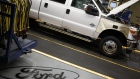 A Ford Motor Co. Super Duty series pickup truck moves down the assembly line at the company's truck manufacturing plant in Louisville, Kentucky, U.S. 