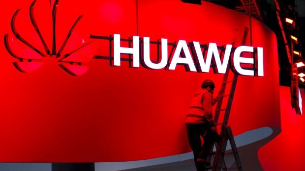 Signage for Huawei Technologies Co. logo is displayed outside a store in Shanghai, China, on Tuesday, Jan. 29, 2019.