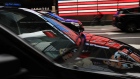 A ride hailing vehicle moves through traffic in Manhattan on July 30, 2018 in New York City. 
