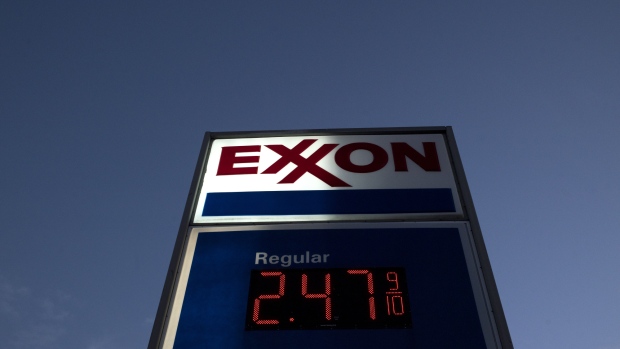 A sign displays fuel prices at an Exxon Mobil Corp. gas station in Nashport, Ohio, U.S., on Friday, Jan. 26, 2018. Exxon Mobil Corp. is scheduled to release earnings figures on February 2. 