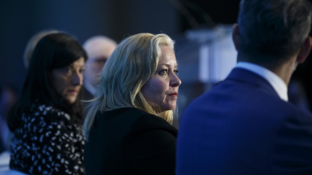 Linda Hasenfratz, president and chief executive officer of Linamar Corp., center, listens during a panel discussion at the Public Policy Forum Canada Growth Summit 3 in Toronto, Ontario, Canada, on Thursday, April 12, 2018. The summit is an annual forum where private, public, academic and other sectors can debate how to enhance prosperity for Canadians in a rapidly changing globalized economy. 