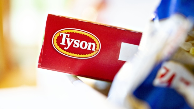 The Tyson Foods Inc. logo is seen on a box arranged for a photograph in Tiskilwa, Illinois, U.S., on Monday, Aug. 6, 2018. The largest U.S. meat company posted better-than-expected fiscal third-quarter earnings as beef demand rose and cattle costs fell, Tyson said Monday in a statement. 