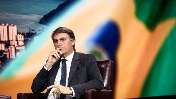 Brazilian Congressman Jair Bolsonaro listens during a Bloomberg Television interview in New York, U.S. 