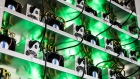 Cryptocurrency mining rigs composed of Antminer S9 ASIC machines operate on racks at the HydroMiner GmbH cryptocurrency mining facility near Waidhofen an der Ybbs, Austria. 