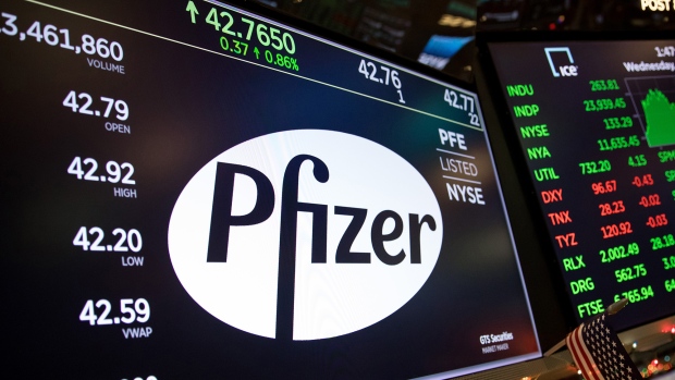 A monitor displays Pfizer Inc. signage on the floor of the New York Stock Exchange. 