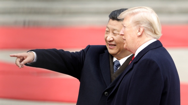X and Trump in Beijing on Nov. 9, 2017. Commerce Secretary Wilbur Ross is set this week to finish an investigation into the national-security risk of auto imports that may mark the next stage in Trump’s effort to rewrite trade policy. Photographer: Qilai Shen/Bloomberg