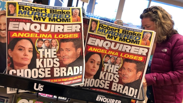 SAN ANSELMO, CA - AUGUST 24: Copies of the National Enquirer are displayed at a grocery store on August 24, 2018 in San Anselmo, California. American Media, Inc. chairman and CEO David Pecker was granted immunity in exchange for cooperation with prosecuters working on the Michael Cohen case of hush payments made to a porn star and former Playboy playmate at the direction U.S. president Donald Trump. (Photo by Justin Sullivan/Getty Images)