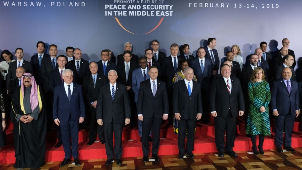WARSAW, POLAND - FEBRUARY 13: Participants, including U.S. Vice President Mike Pence, U.S. Secretary of State Mike Pompeo, Polish President Andrzej Duda and Israeli Prime Minister Benjamin Netanyahu, attend a group photo prior to the dinner on the opening evening of the Ministerial to Promote Peace and Security in the Middle East on February 13, 2019 in Warsaw, Poland. The ministerial is a conference on the Middle East sponsored by the Polish and U.S. governments. Many European countries are only sending junior representatives or leaving the two-day conference early as E.U. and U.S. policies towards the Middle East and Iran have increasingly diverged since the Trump administration took power. (Photo by Sean Gallup/Getty Images)