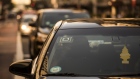 The Uber Technologies Inc. logo is seen on the windshield of a vehicle in New York, U.S. 