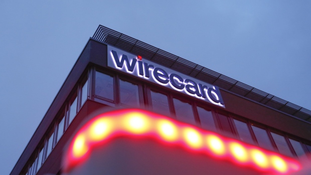 An illuminated logo sits on the exterior of the Wirecard AG headquarters in the Aschheim district of Munich, Germany, on Tuesday, Feb. 12, 2019. Wirecard broke federal securities law by failing to act on an executive’s misconduct and misleading investors about it, a complaint filed Feb. 8 in the Central District of California alleges. 
