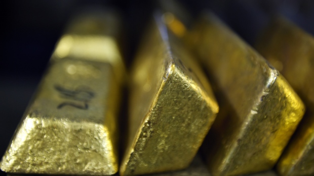 Gold bars sit in a vault at the Perth Mint Refinery, operated by Gold Corp., in Perth, Australia, on Thursday, Aug. 9, 2018. Demand for coins and minted bars was a little sluggish over the past year as Donald Trump's earlier win in the presidential poll prompted investors to divert funds into stocks, bonds and property, said Perth Mint's Chief Executive Officer Richard Hayes on Aug. 8. Photographer: Carla Gottgens/Bloomberg
