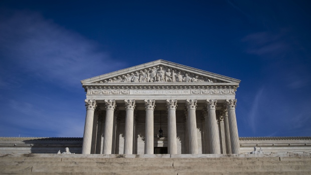 The U.S. Supreme Court building stands in Washington, D.C., U.S., on Tuesday, Jan. 22, 2019. A divided U.S. Supreme Court cleared President Donald Trump's administration to start barring most transgender people from serving in the armed forces. The justices, voting 5-4 Tuesday, put on hold lower court decisions that had blocked the administration's planned ban from taking effect. 