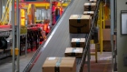 Packages move along a conveyor at the Amazon.com Inc. fulfillment center in Robbinsville, New Jersey, U.S., on Thursday, June 7, 2018. 