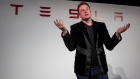 Elon Musk, chairman and chief executive officer of Tesla Motors Inc., gestures as he speaks during a news conference prior to unveiling the Model X sport utility vehicle (SUV) during an event in Fremont, California, U.S. 