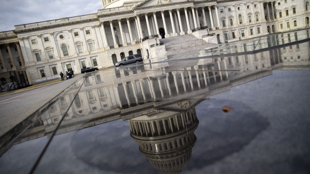 The U.S. Capitol building is reflected in a pool in Washington, D.C. 