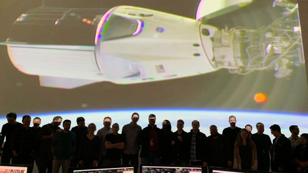 The SpaceX team in Hawthorne, Calif., watches as the SpaceX Crew Dragon docks with the ISS. 