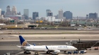 A United Continental Holdings Inc. airplane sits outside the company's terminal at Newark Liberty International Airport (EWR) in Newark, New Jersey, U.S., on Wednesday, April 12, 2017. United Airlines is under fire for forcibly removing a passenger from a plane in Chicago shortly before departure to make room for company employees, an incident which demonstrates how airline bumping can quickly veer into confrontation. 