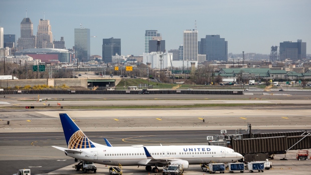 A United Continental Holdings Inc. airplane sits outside the company's terminal at Newark Liberty International Airport (EWR) in Newark, New Jersey, U.S., on Wednesday, April 12, 2017. United Airlines is under fire for forcibly removing a passenger from a plane in Chicago shortly before departure to make room for company employees, an incident which demonstrates how airline bumping can quickly veer into confrontation. 