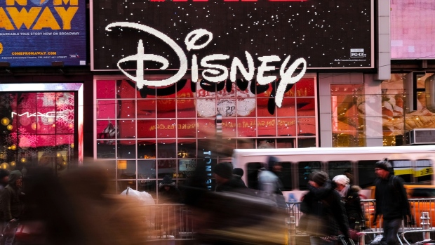 NEW YORK, NY - DECEMBER 14: The Disney logo is displayed outside the Disney Store in Times Square, December 14, 2017 in New York City. The Walt Disney Company announced on Thursday morning that it had reached a deal to purchase most of the assets of 21st Century Fox. The deal has a total value of around $66 billion, with Disney assuming $13.7 billion of Fox's net debt. (Photo by Drew Angerer/Getty Images)