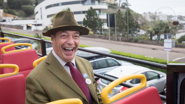 TORQUAY, ENGLAND - OCTOBER 13: MEP and former leader of the UK Independence Party (UKIP) Nigel Farage travels on the pro-Brexit 'Leave Means Leave' battle bus ahead of the 'Leave Means Rally' at the Rivera International Centre on October 13, 2018 in Torquay, England. Leave Means Leave is a pro-Brexit campaign, holding a series of rallies and events across the United Kingdom. (Photo by Matt Cardy/Getty Images)