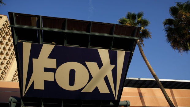 Signage is displayed outside the entrance to Twenty-First Century Fox Inc. Studios in the Century City neighborhood of Los Angeles, California, U.S., on Tuesday, July 24, 2018. 