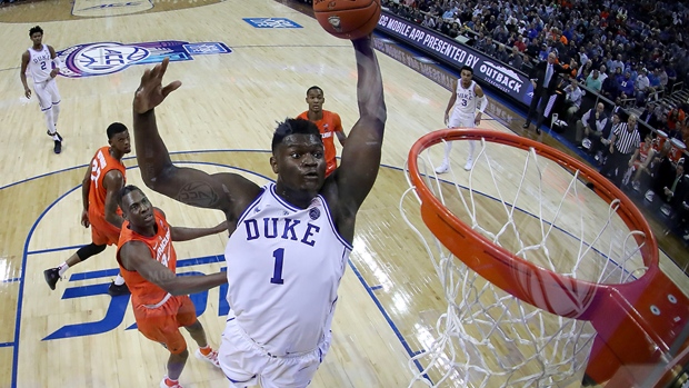 CHARLOTTE, NORTH CAROLINA - MARCH 14: (EDITOR'S NOTE: Alternate crop.) Zion Williamson #1 of the Duke Blue Devils dunks the ball against the Syracuse Orange during their game in the quarterfinal round of the 2019 Men's ACC Basketball Tournament at Spectrum Center on March 14, 2019 in Charlotte, North Carolina. (Photo by Streeter Lecka/Getty Images)