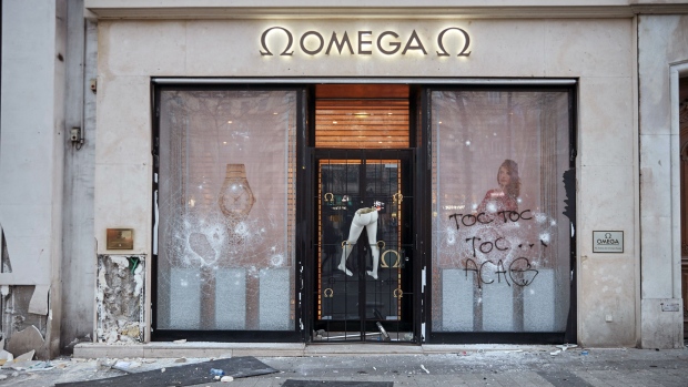 PARIS, FRANCE - MARCH 16: The vandalised Omega store on the Champs Elysees after Act 18 of protests, presented as an "ultimatum" to President Macron, which saw widespread rioting and looting on March 16, 2019 in Paris, France. The yellow vests have called for a revival on the occasion of the end of the Macron's 'great national debate', after two months of meetings throughout France, which many yellow vests considered a "masquerade". (Photo by Kiran Ridley/Getty Images)