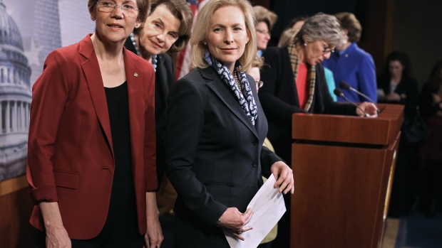 WASHINGTON, DC - JANUARY 30: (L-R) Sen. Elizabeth Warren (D-MA), Sen. Dianne Feinstein (D-CA), Sen. Kirsten Gillibrand (D-NY) and other women Democratic sentaors hold a news conference to announce their support for raising the minimum wage to $10.10 at the U.S. Capitol January 30, 2014 in Washington, DC. Thirteen of the 16 Democratic women senators were at the news conference. (Photo by Chip Somodevilla/Getty Images)