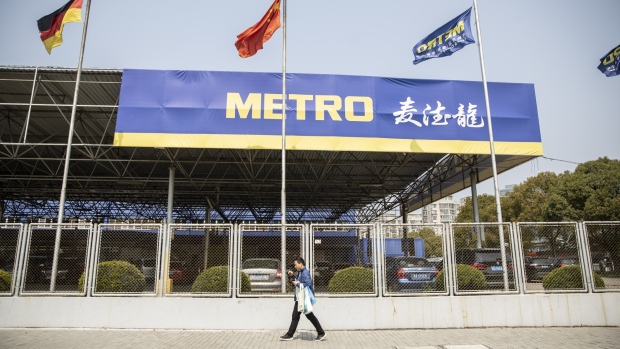 A Metro AG store stands in Shanghai, China, on Wednesday, March 20, 2019. German food wholesaler Metro's Chinese business has attracted potential bidders including internet giant Tencent Holdings Ltd. and domestic buyout firm Citic Private Equity, people with knowledge of the matter said. 