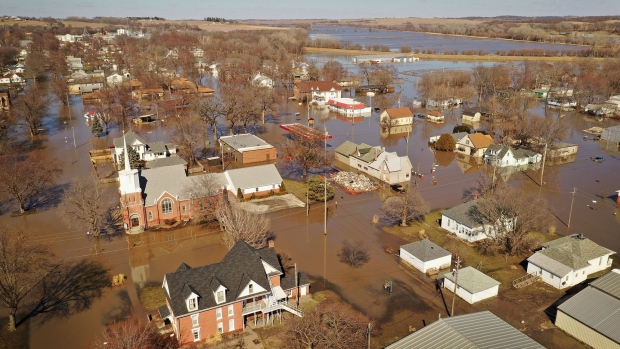 HAMBURG, IOWA - MARCH 20: Homes and businesses are surrounded by floodwater on March 20, 2019 in Hamburg, Iowa. Several Midwest states are battling some of the worst flooding they have experienced in decades as rain and snow melt from the recent "bomb cyclone" has inundated rivers and streams. At least three deaths have been linked to the flooding. (Photo by Scott Olson/Getty Images)