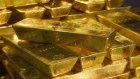A stack of gold bars sits in a Goldcorp Inc. vault in Toronto, Ontario, Canada .
