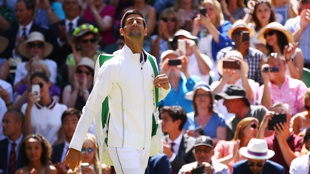 LONDON, ENGLAND - JULY 15: Novak Djokovic of Serbia walks out onto Centre Court ahead of the Men's Singles final against Kevin Anderson of South Africa on day thirteen of the Wimbledon Lawn Tennis Championships at All England Lawn Tennis and Croquet Club on July 15, 2018 in London, England. (Photo by Clive Brunskill/Getty Images)
