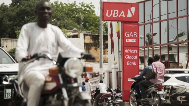 A sign sits on display outside the headquarters of the United Bank of Africa Plc (UBA) in N'Djamena, Chad, on Tuesday, Aug. 15, 2017. African Development Bank and nations signed agreement to finance a project linking the town of Ngouandere in Cameroon and Chad’s capital, N’Djamena, according to statement handed to reporters in Cameroonian capital, Yaounde in July. 