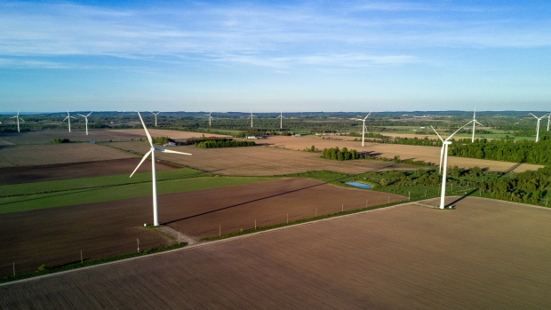 Wind turbines stand in this aerial photograph taken above Shelburne, Ontario, Canada, on Sunday, May 28, 2017. Canada has quietly reared a formidable crop of homegrown renewables champions over the past decade, fortified by the country’s stable hydro and vibrant wind markets. 