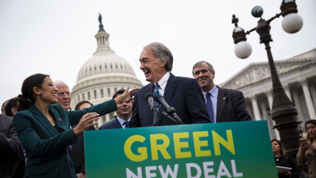 Ed Markey and Alexandria Ocasio-Cortez announce Green New Deal legislation in February. Photographer: Al Drago/Bloomberg