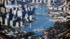 Boats are seen anchored at False Creek in this aerial photograph taken above Vancouver, British Columbia, Canada, on Thursday, Sept. 6, 2018. 