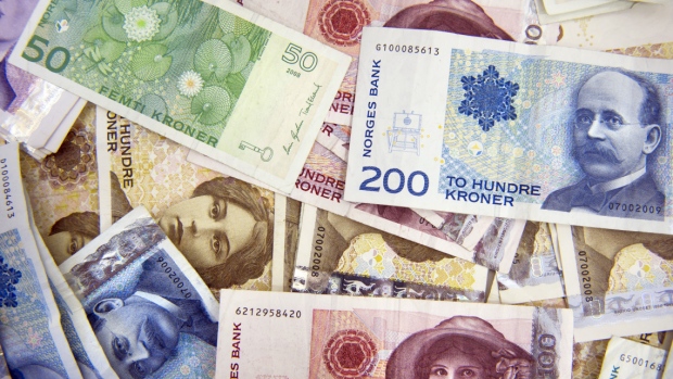 Various denominations of the krone Norwegian bank notes are seen displayed for a photograph at a Forex currency exchange center in Oslo, Norway. 