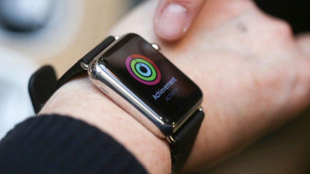 A customer looks at the activity app on an Apple Watch smartwatch during a preview event at Apple Inc.'s Covent Garden store in London, U.K.