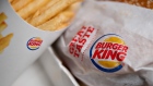A Burger King Whopper hamburger is arranged with french fries for a photograph in Tiskilwa, Illinois, U.S. 
