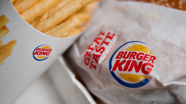 A Burger King Whopper hamburger is arranged with french fries for a photograph in Tiskilwa, Illinois, U.S. 