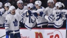 William Nylander #29 of the Toronto Maple Leafs celebrates a second period goal with teammates on the bench against the Montreal Canadiens during the NHL game at the Bell Centre on April 6, 2019 in Montreal, Quebec, Canada. 