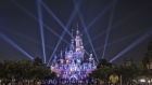 Lights are displayed outside the Enchanted Storybook Castle during the one-year celebration of Walt Disney Co. Shanghai Disneyland resort at the theme park in Shanghai, China, on Friday, June 16, 2017. Walt Disney Co. Chief Executive Officer Bob Iger said he stepped down from Donald Trump's jobs panel two weeks ago following the president's decision to exit the Paris Accord on climate change because businesses must accept responsibility to protect the environment. 